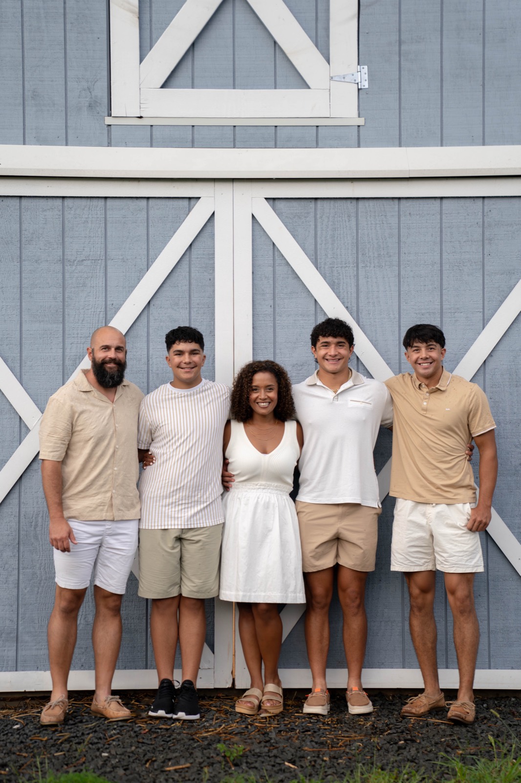 Erica Tredinnick with her husband Joshua and their three sons